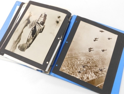 Two albums of black and white aviation postcards, to include scenes of Gibraltar, The Grand Venetian Harbour, Bombing Hits On Merchant Ships, Crewman, Tripoli, A Panam folder of military aviation black and white photographs, maps, official guides with ann - 10