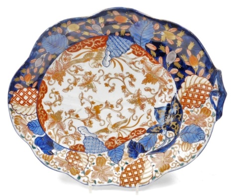 A late 19thC Japanese Imari serving plate, 38cm wide.