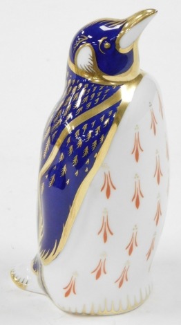 A Royal Crown Derby Emperor penguin paperweight, lacking stopper, 13.5cm high.