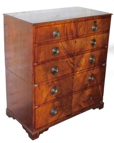 An early 19thC mahogany chest, of two short and four long drawers, with Hobbs and Co of London locks, with two split section, on bracket feet, 113cm high, 101cm wide, 54cm deep.