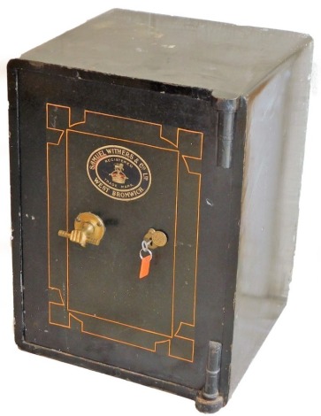 A Samuel Withers and Co of West Bromwich metal safe, the turning handle with clasp hand holding column, with single key, 60cm high, 46cm wide, 44cm deep.