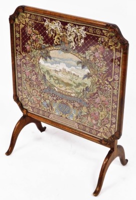 A walnut and embroidered firescreen, for the Royal Windsor June 2nd 1953, also convertible to a table, 82cm high, 66cm wide.