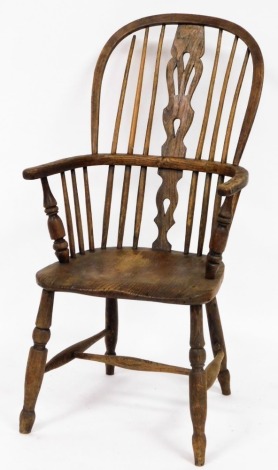 A 19thC ash and elm Windsor chair, with pierced splat back and H frame base, 114cm high, 54cm wide, 50cm deep.