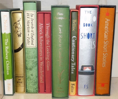 Folio Society. Eight volumes, comprising American Short Stories, The Folio Book of Short Novels, Cautionary Tales, Lark Rise to Candleford, Through The Looking Glass, Alice's Adventure In Wonderland, In Search of England, The Pick of Punch and The Railway