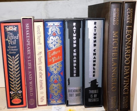 Folio Society. Eight various volumes to include Leonardo Da Vinci,, Michelangelo, Raymond Chandler, Trouble In Mt Business and Blackmailers Don't Shoot, Letters to Vicky, Shakespeare's Life and World, The Lifted Vail and My Family and Other Animals. (8)