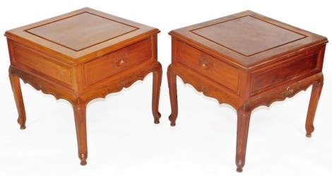 A pair of Chinese hardwood side tables, each with square top above single drawer with leaf scroll handle and cabriole legs, 55cm high, 56cm wide, 56cm deep.