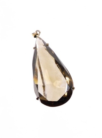 A Smokey Quartz pendant, the tear drop shaped pendant in a silvered colour clasp, 4.5cm high.