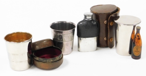 A group of drinking related trinkets, silver plated beaker, leather cased and silver plated beaker set, hip flask, miniature Guinness bottle, etc. (a quantity)