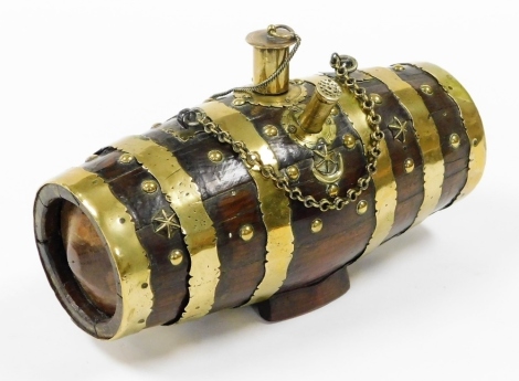 An ebony and brass bound ship's barrel, each with buckle detail and stopper with chain, 27cm wide.