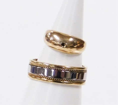 Two dress rings, to include a single stone set dress ring, yellow metal stamped 9ct, stone missing, together with a gentleman's two tone wedding band, yellow metal stamped 9kt, 7.2g all in.