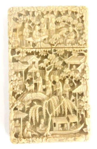 A 19thC Chinese carved ivory card case, decorated with figures, buildings, bridge, flowers, etc., 11cm high, 6.5cm wide.