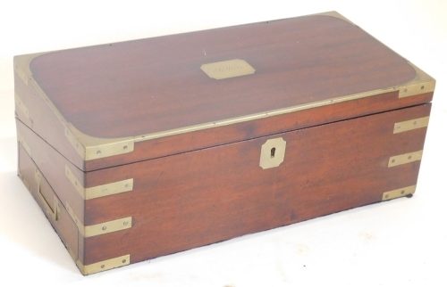 A 19thC mahogany and brass bound campaign writing box, the rectangular top engraved with cartouche EJ Moore.