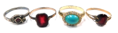 Four various dress rings, each with coloured stones, most mounts unmarked.