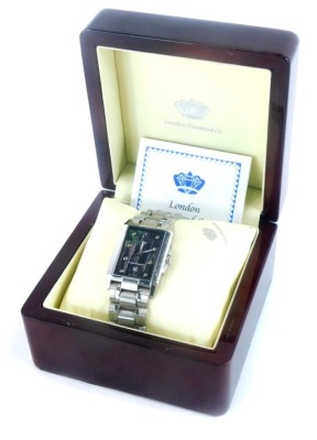 A London Diamond Company gentlemans wristwatch, with rectangular dial on a black lustre finish with inset stones, on stainless steel bracelet, with certificate, boxed.