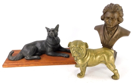 A painted plaster figure of Beethoven, a brass bulldog and a spelter Alsatian. (3)