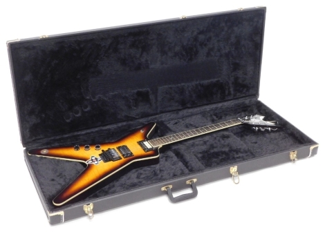 A Dean Dime Bag Darrell Flying V electric guitar, left handed, with Seymour pick up, in a hard case.