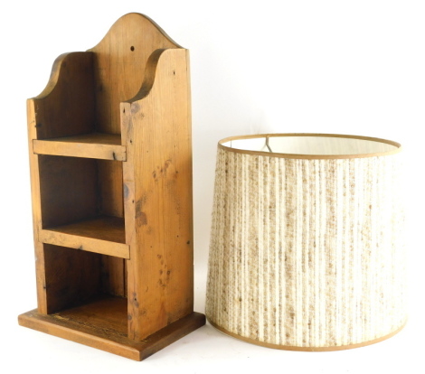 Various treen, a rustic hanging shelf with three sections and shaped back, 60cm high, and a lightshade.