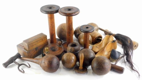 Various treen, 19thC and later, to include a named oak box of rectangular form, 17cm wide, with copper Judd and Mumford 1897 plaque, a large sea fishing reel, various orbs, other treen, hooks, fishing reels, wooden head figure, various other interesting t