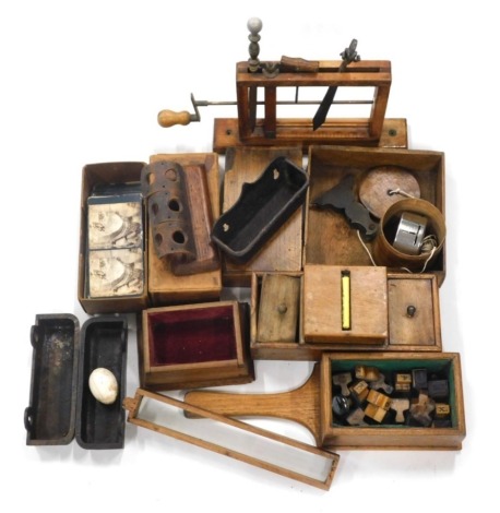Various treen, bygones, collectables, etc., a stand with various iron implements, book, metalware, cabinet selection box, four dummy eggs, miniature cabinet, other treen, advertising collectables, stereoscopic viewer cards, cylindrical string box, etc., (