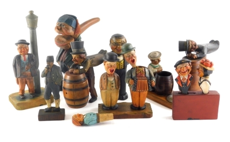 A good and varied selection of continental carved articulated figures, to include cork screws, shoe brush, nutcracker formed as a comical figure with articulated handle, 25cm high, cork screw and bottle opener set, etc. (a quantity)