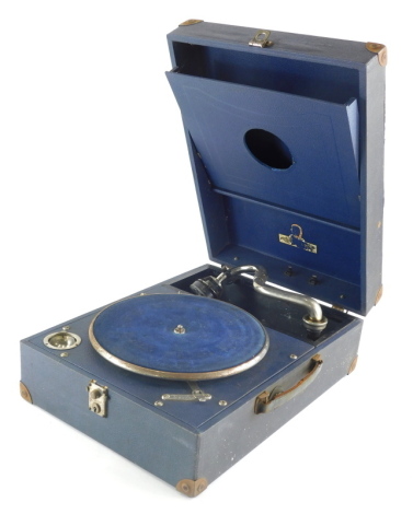 A vintage mid 20thC table top record player, impressed leather case with articulated chrome arm and blue baize lined turn table, in fitted case, 32cm wide.