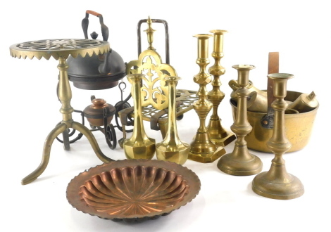 Various brassware, a pair of candlesticks, other early 20thC, a stand, 30cm high, copper and other ware, kettle, etc. (a quantity)