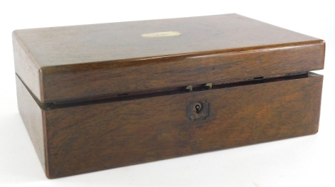 A 19thC rosewood writing slope, of rectangular form, the plain lid revealing a fitted interior with spaces for ink bottles, pens, etc., 13cm high, 36cm wide, 20cm deep. (AF)