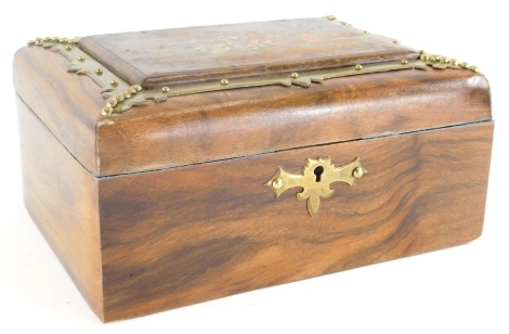 A 19thC and later partially painted and brass inlaid domed top jewellery casket, with a velvet lined interior in blue, outer brass escutcheon and pressed leather section to the underside, 12cm high, 23cm wide, 17cm deep.