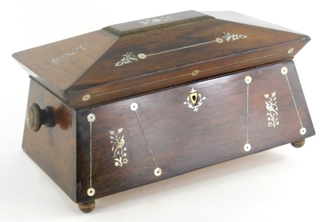 An early 19thC and later Regency rosewood sarcophagus shaped tea caddy, of rectangular form with turned side handles and a mother of pearl inlay, in a lime and floral pattern, with a plain interior on bun feet, 23cm high, 36cm wide, 16cm deep. (AF)