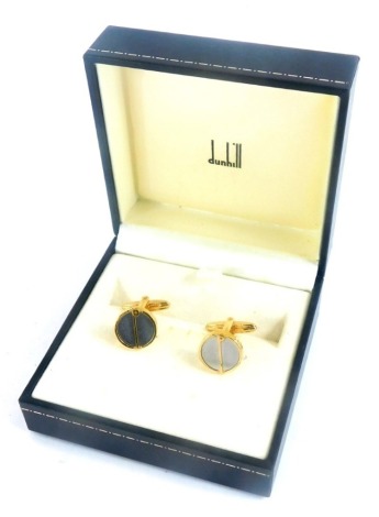 A pair of Dunhill gold plated gentleman's cuff links, each with brushed steel two part front, boxed.