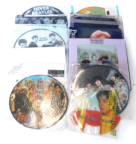 A quantity of Beatles and Paul McCartney records, mainly late edition picture discs, to include Silver Beatles, A Conversation With George Martin, Timeless volume 2, limited edition box set of Beatles compact discs, etc.