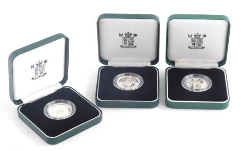 A Scottish and three silver proof coins, to include two 1994 silver proof two pound coins and a 1992 example.