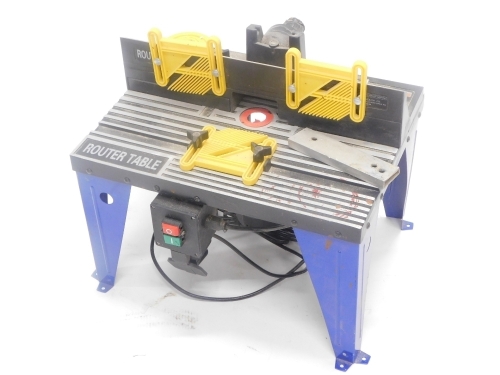 An electric router table, 46cm wide.