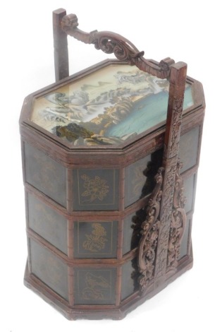 A oriental hardwood and lacquer sectional box, the reverse painted glass top decorated with buildings, river landscape, etc. sides decorated with dragons, flowers and leaves, 64cm high, 41cm wide.