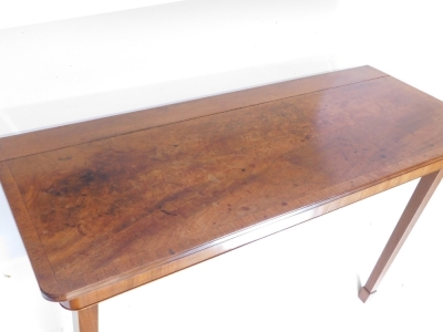 A mahogany folding table, the rectangular crossbanded top above a plain frieze on two hinged square tapering legs to the front and two removable legs to the reverse, 19thC but adapted, 124cm wide, 51cm deep, (AF). - 2