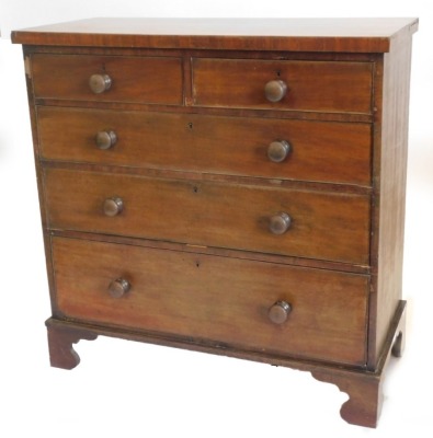 A 19thC mahogany chest of two short and three long drawers, each with turned wood handles on bracket feet, 107cm wide.