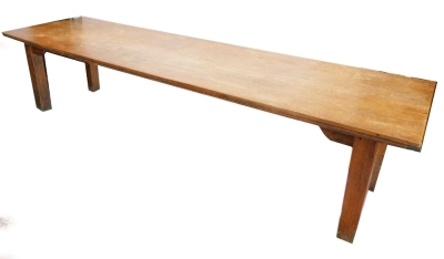 A large mahogany and oak refectory type table, with a planked top, on square tapering legs, 72cm high, the top 84cm x 305cm.