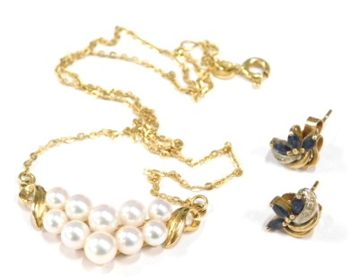 Two items of jewellery, to include a pair of 9ct gold floral scroll earrings, each set with cz and blue stones. 1.6g, together with a cultured pearl necklace, the clasp marked 750. (2)