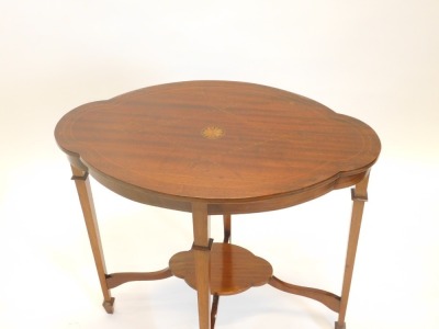 An Edwardian mahogany boxwood and chequer banded window table, the lobed top on square tapering legs with under tier, 76cm wide.