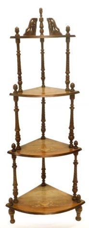 A Victorian walnut and marquetry four tier what not, on turned supports, 145cm high.