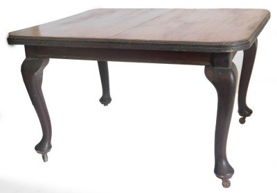 An early 20thC mahogany extending dining table, on cabriole legs with pad feet, 120cm wide.