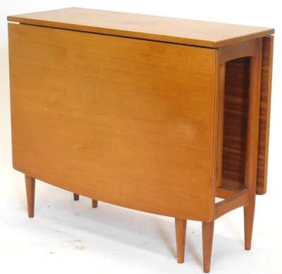 A 1970s/80s teak drop leaf table, on turned legs, 84cm wide.