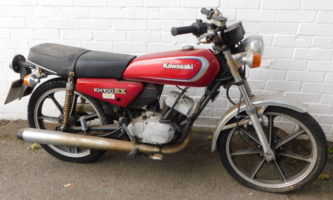 A Kawasaki KH100EX motorcycle, registration NRC73W, mileage on clock 471.2miles.