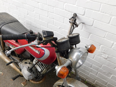 A Kawasaki KH100EX motorcycle, registration NRC73W, mileage on clock 471.2miles. - 2