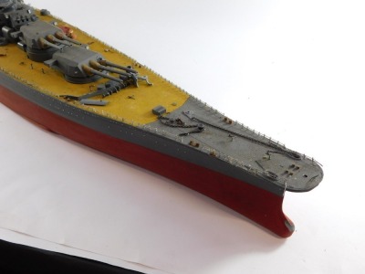 A scale model of a Japanese WWII battle ship, possibly The Yamato, modeled with armourments, deck planes, etc., 131cm wide. - 5