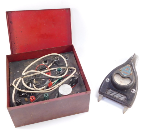 A Morrall & Whiteley Ltd testometer, The Red Box, together with a Davenset High Discharge battery charger and tester. (2)