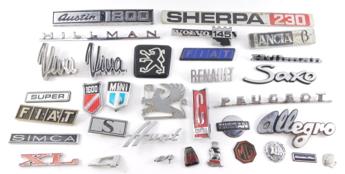 Various metal and plastic car emblems, including Ford Cortina, Viva, Sherpa, Peugeot and Lancia. (a quantity)