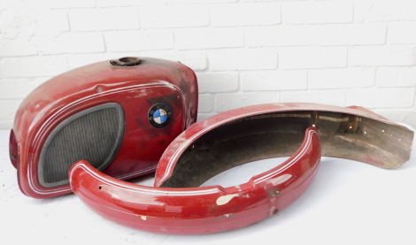 A BMW motorcycle petrol tank and two mud guards.