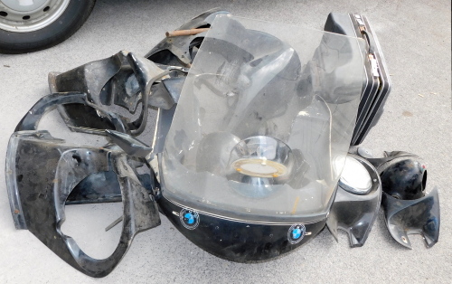 BMW and other body work parts, together with a BMW side pannier. (a quantity)