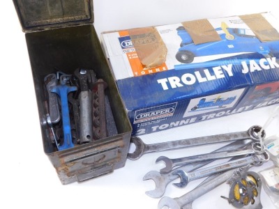 A Draper trolley jack, further jack, MG hub caps, AA badge, Derby spanners and further spanners, contained in an ammo box. (a quantity) - 2